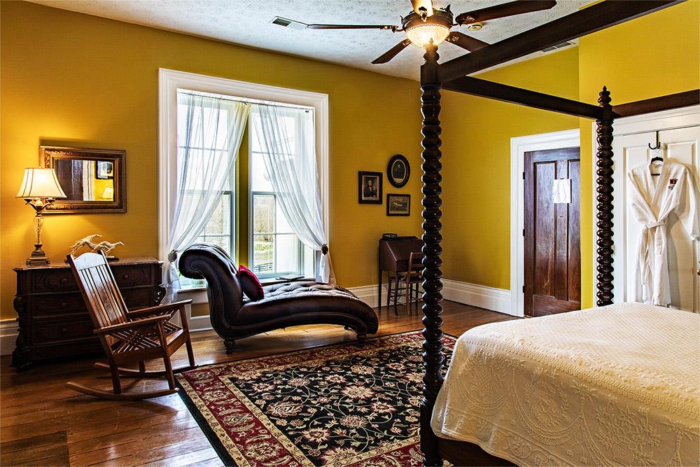 Miller's Station room, beautiful yellow walls, double seven foot window