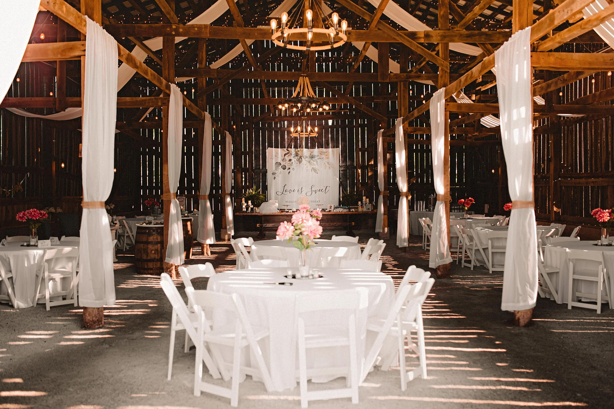 barn set up for a wedding reception